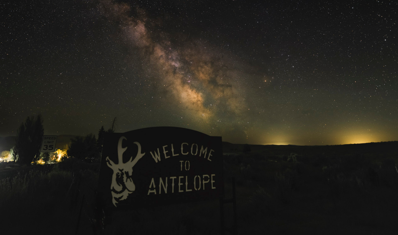 Milky Way over the welcome to Antelope sign.